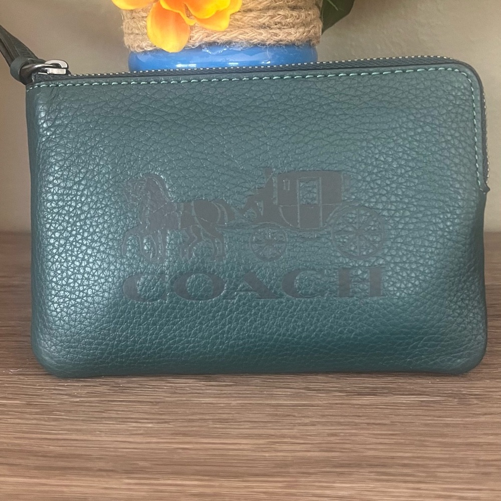 Coach on color green